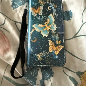 Butterfly Print Wallet Phone Case in Teal and Gold. iPhone 16 pro max case.